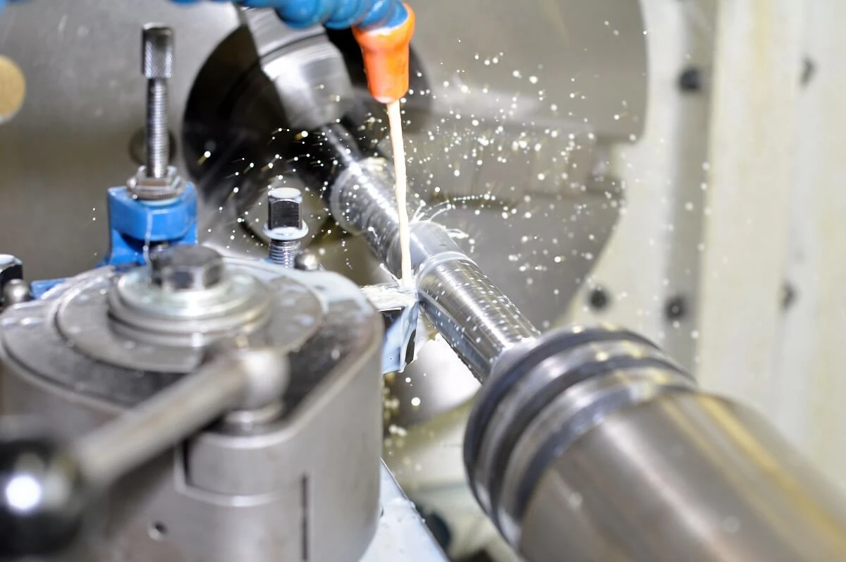 What is the threading process in CNC turning?