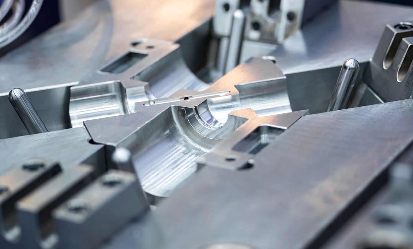 What is the difference between high pressure and low pressure die casting?